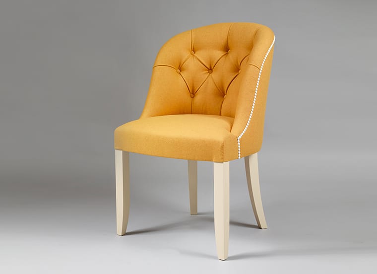 Buttoned back side chair