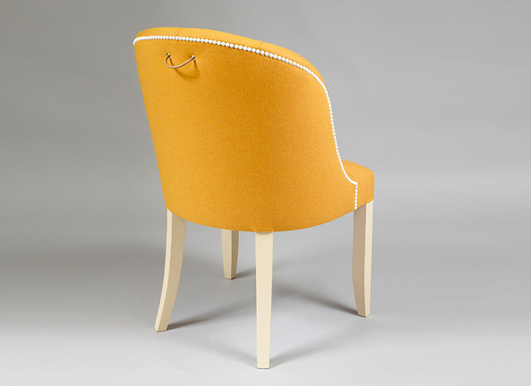 Buttoned back side chair